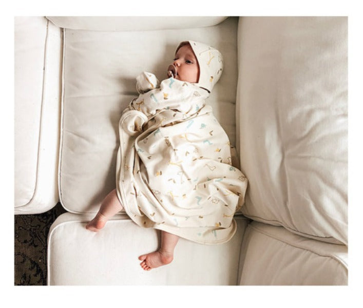 HIPZOO organic newborn five-piece animal-print set with kimono top, swaddle blanket, bib, pilot cap, and mittens