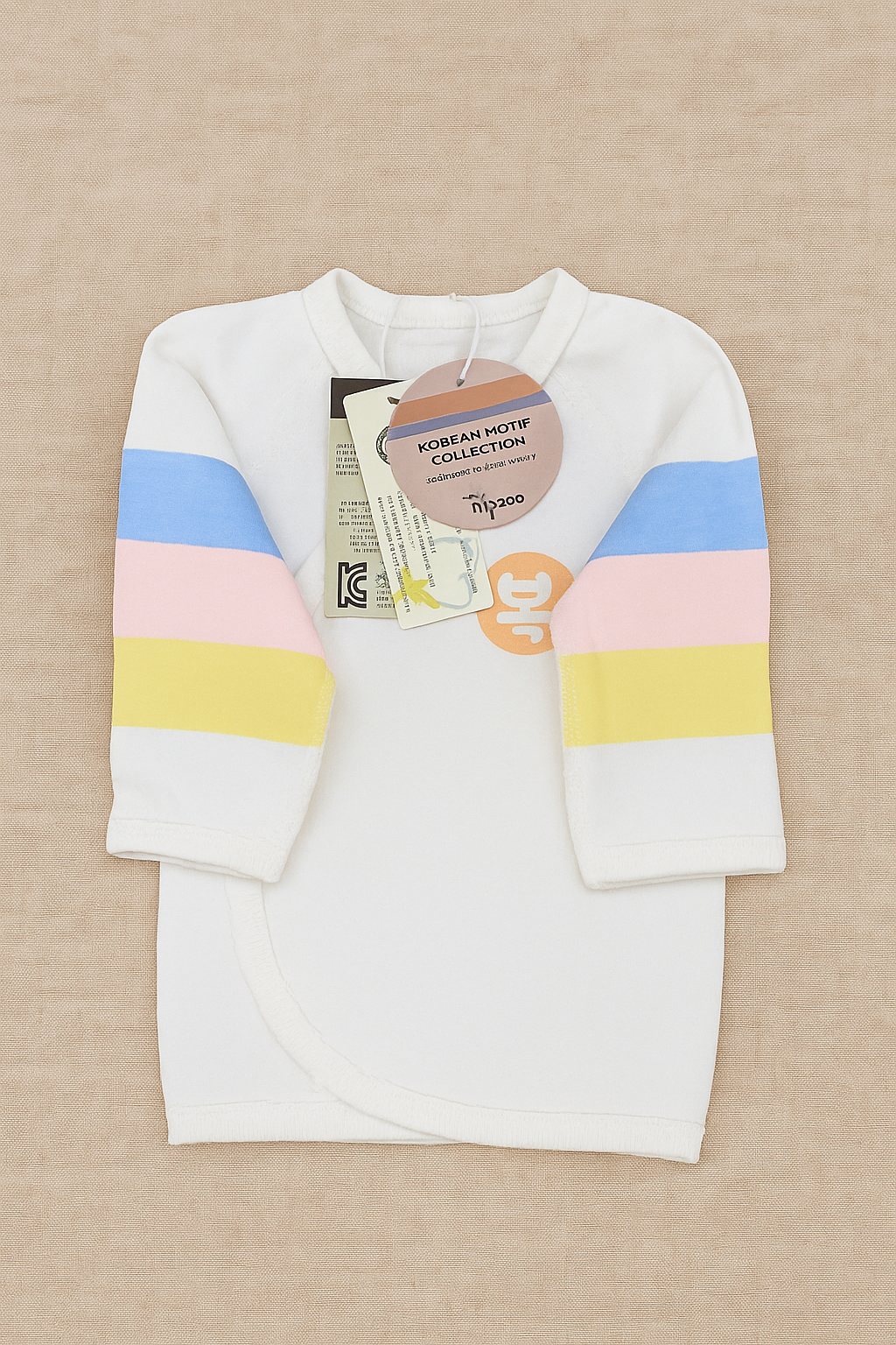HIPZOO saekdong newborn jeogori laid flat with overlapping front and long sleeves
